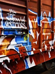 Preview wallpaper trailer, car, graffiti, colorful, metal