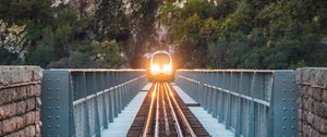 Preview wallpaper train, bridge, rock, light