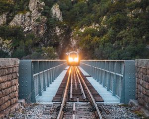 Preview wallpaper train, bridge, rock, light