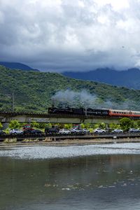 Preview wallpaper train, cars, smoke, bridge, river, hills, mountains