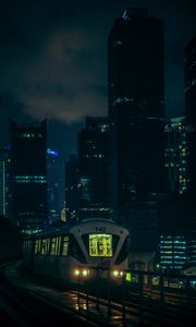 Preview wallpaper train, city, night, buildings, dark