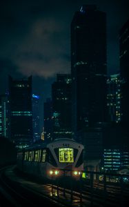 Preview wallpaper train, city, night, buildings, dark