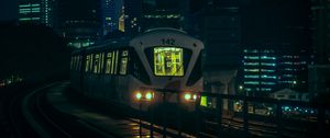 Preview wallpaper train, city, night, buildings, dark