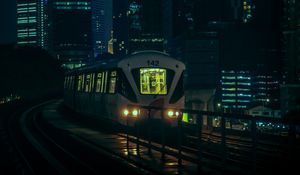 Preview wallpaper train, city, night, buildings, dark