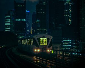 Preview wallpaper train, city, night, buildings, dark