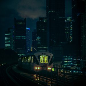Preview wallpaper train, city, night, buildings, dark