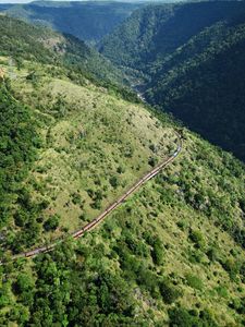 Preview wallpaper train, height, wood, mountains, railway, movement, green, trees