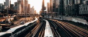 Preview wallpaper train, rails, city, buildings, sunset