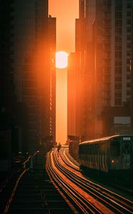 Preview wallpaper train, railway, buildings, sun, sunset
