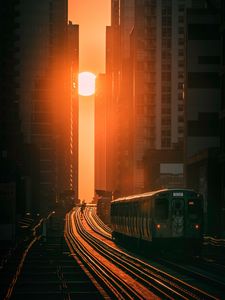 Preview wallpaper train, railway, buildings, sun, sunset
