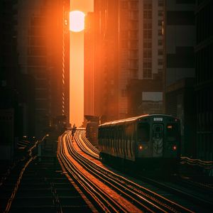 Preview wallpaper train, railway, buildings, sun, sunset