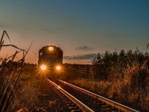 Preview wallpaper train, railway, evening, glow