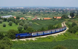 Preview wallpaper train, structure, dark blue, fields, trees, from above, city, suburb, distance, summer, railway