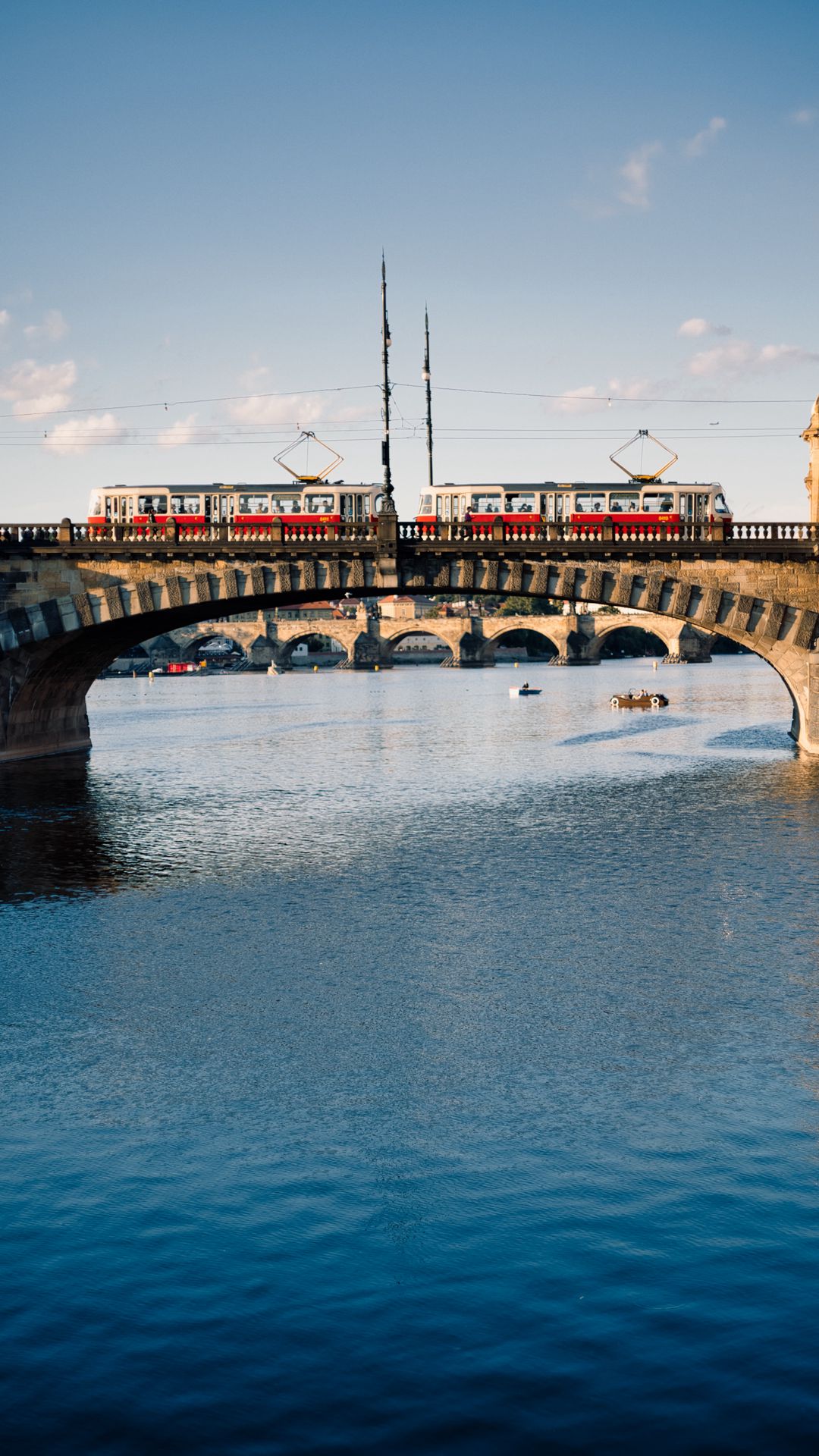 Download wallpaper 1080x1920 tram, bridge, river, water samsung galaxy