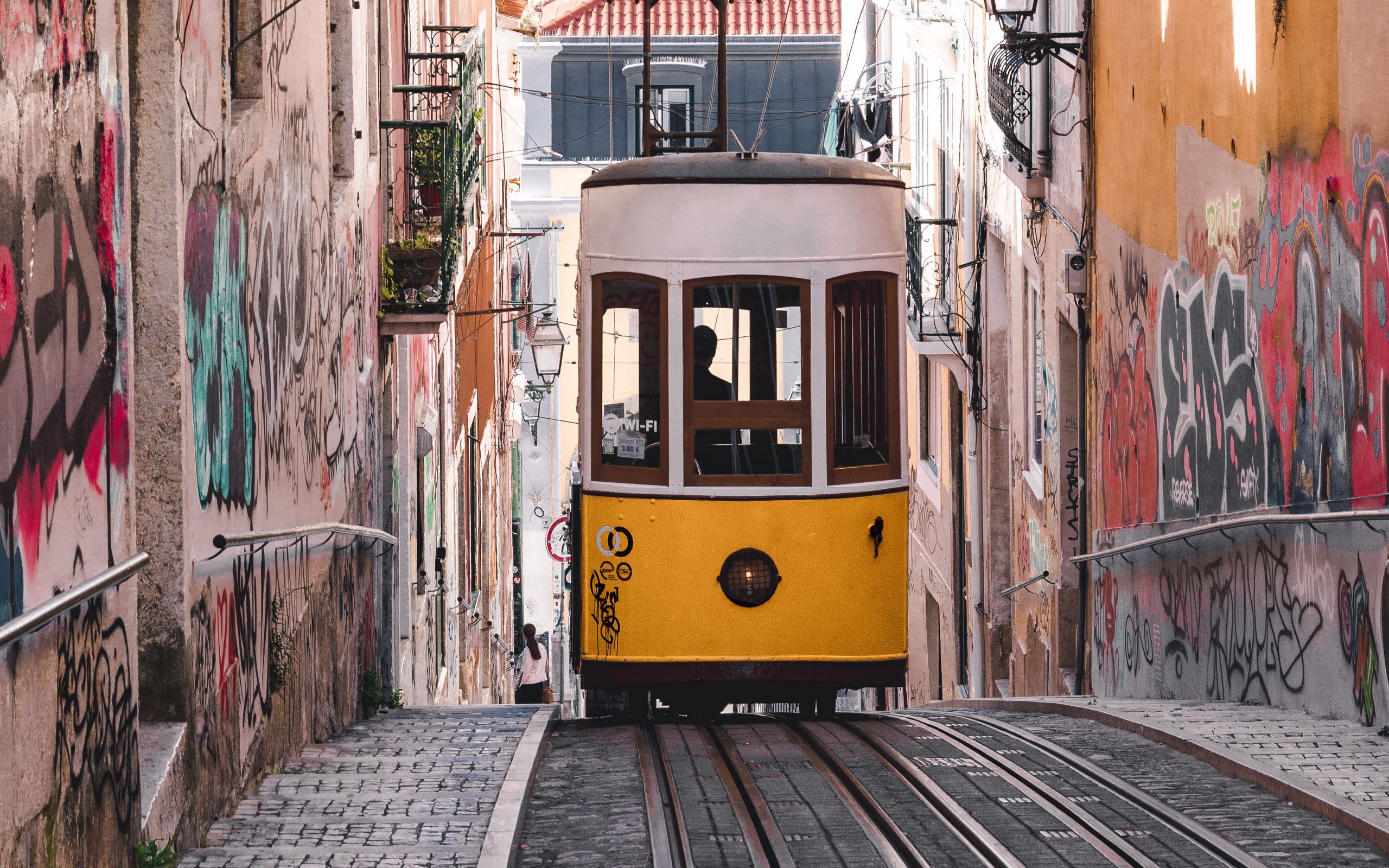 Download Wallpaper 2560x1600 Tram, Yellow, City, Street, Buildings 