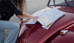 Preview wallpaper travel, map, guidebook, hood, car, hands