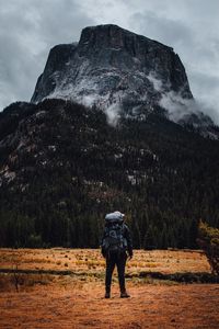 Preview wallpaper traveler, travel, mountains, backpack, rocks