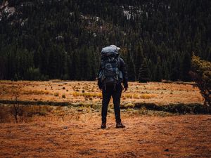 Preview wallpaper traveler, travel, mountains, backpack, rocks