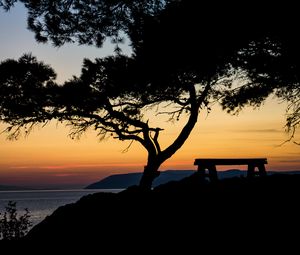 Preview wallpaper tree, bench, silhouettes, sea, twilight