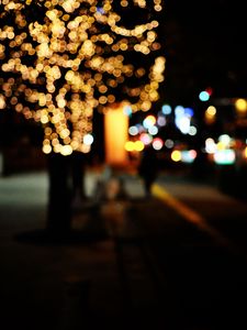 Preview wallpaper tree, garland, street, lights, bokeh, blur