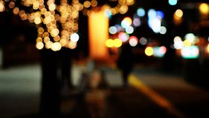 Preview wallpaper tree, garland, street, lights, bokeh, blur