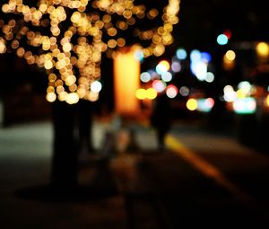 Preview wallpaper tree, garland, street, lights, bokeh, blur