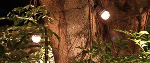 Preview wallpaper tree, leaves, garland, glow