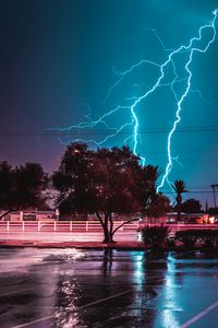 Preview wallpaper tree, lightning, night, road