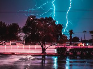 Preview wallpaper tree, lightning, night, road