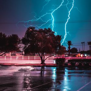 Preview wallpaper tree, lightning, night, road