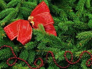 Preview wallpaper tree, pine needles, twigs, ribbon, ornaments