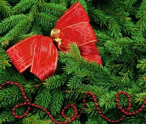Preview wallpaper tree, pine needles, twigs, ribbon, ornaments
