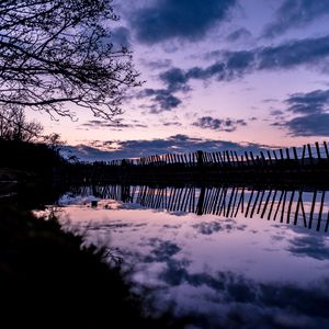 Preview wallpaper tree, river, fence, reflection, evening
