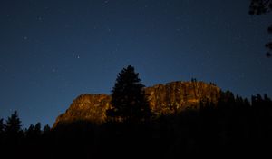 Preview wallpaper tree, rock, mountain, night