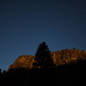 Preview wallpaper tree, rock, mountain, night