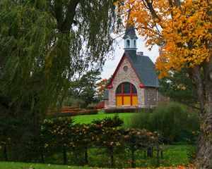 Preview wallpaper trees, autumn, house, tower, lawn