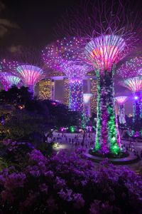 Preview wallpaper trees, backlight, decoration, city, architecture