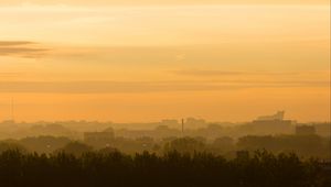 Preview wallpaper trees, buildings, tower, silhouettes, fog, sunrise