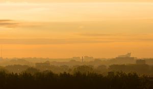 Preview wallpaper trees, buildings, tower, silhouettes, fog, sunrise