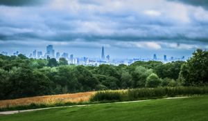 Preview wallpaper trees, city, buildings, meadow