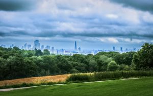 Preview wallpaper trees, city, buildings, meadow