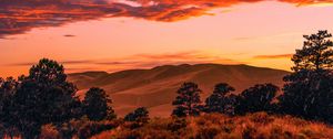 Preview wallpaper trees, clouds, hills, sunset