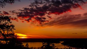 Preview wallpaper trees, lake, sunset, clouds, sky, evening