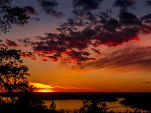 Preview wallpaper trees, lake, sunset, clouds, sky, evening