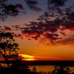 Preview wallpaper trees, lake, sunset, clouds, sky, evening