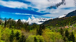 Preview wallpaper trees, mountains, clouds, snow, nature, landscape