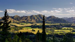 Preview wallpaper trees, mountains, valley, houses, nature