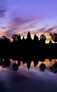 Preview wallpaper trees, reflection, silhouettes, pond, dark, evening, sky