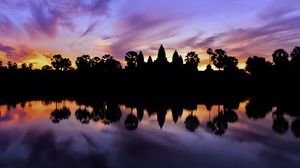 Preview wallpaper trees, reflection, silhouettes, pond, dark, evening, sky