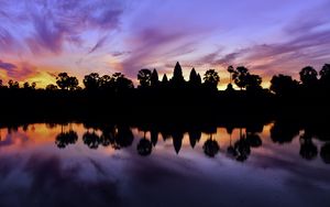 Preview wallpaper trees, reflection, silhouettes, pond, dark, evening, sky